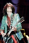 https://upload.wikimedia.org/wikipedia/commons/thumb/2/24/Joe_Perry_of_Aerosmith_5_April_2013.jpg/100px-Joe_Perry_of_Aerosmith_5_April_2013.jpg